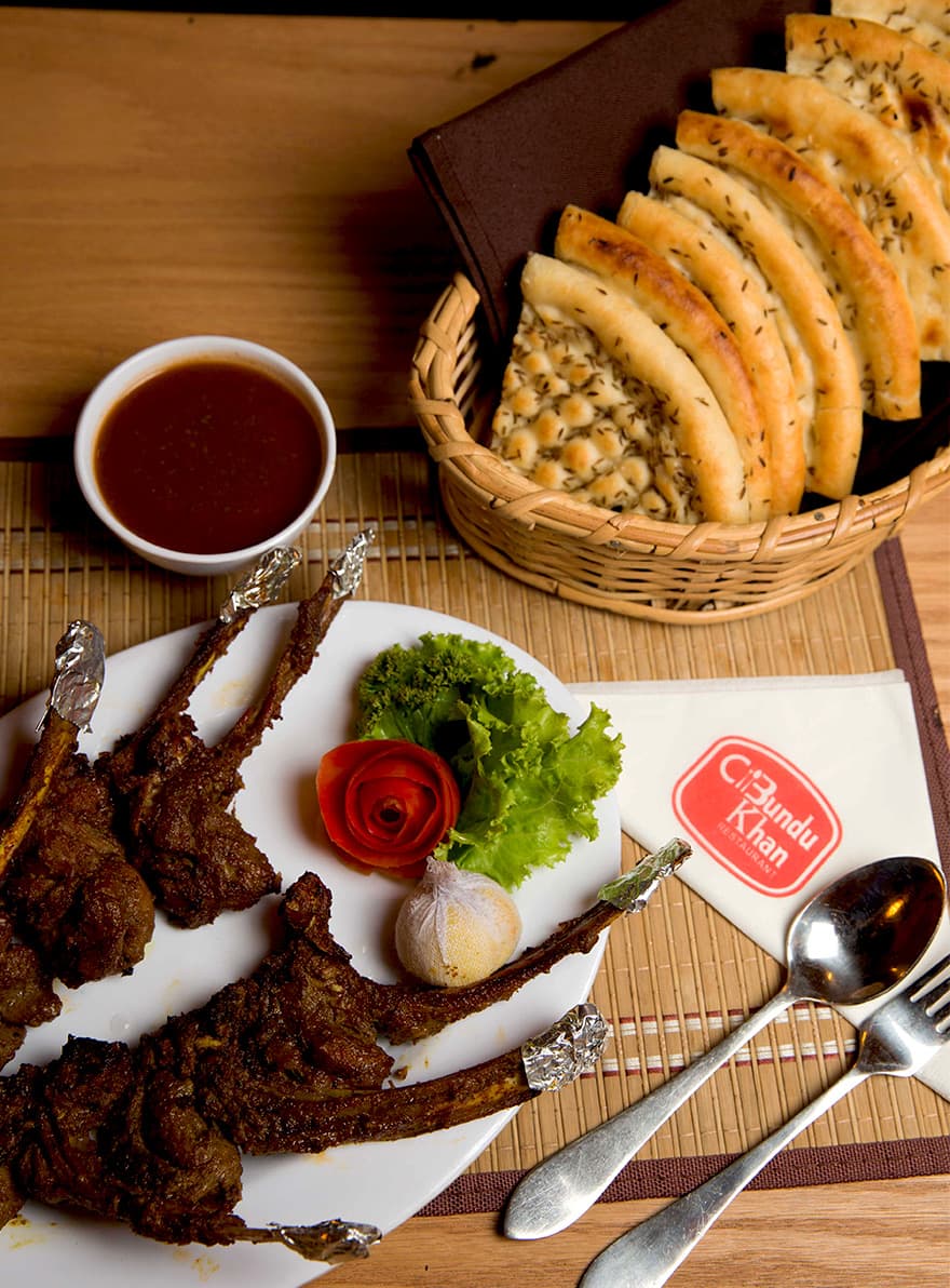 Bundu Khan barbecue restaurant photography by Qaurus, frame 1 of 5